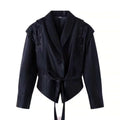 Blazer en simili cuir ceinturé — épaules structurées